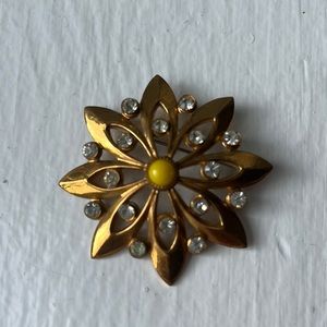 Gold floral brooch